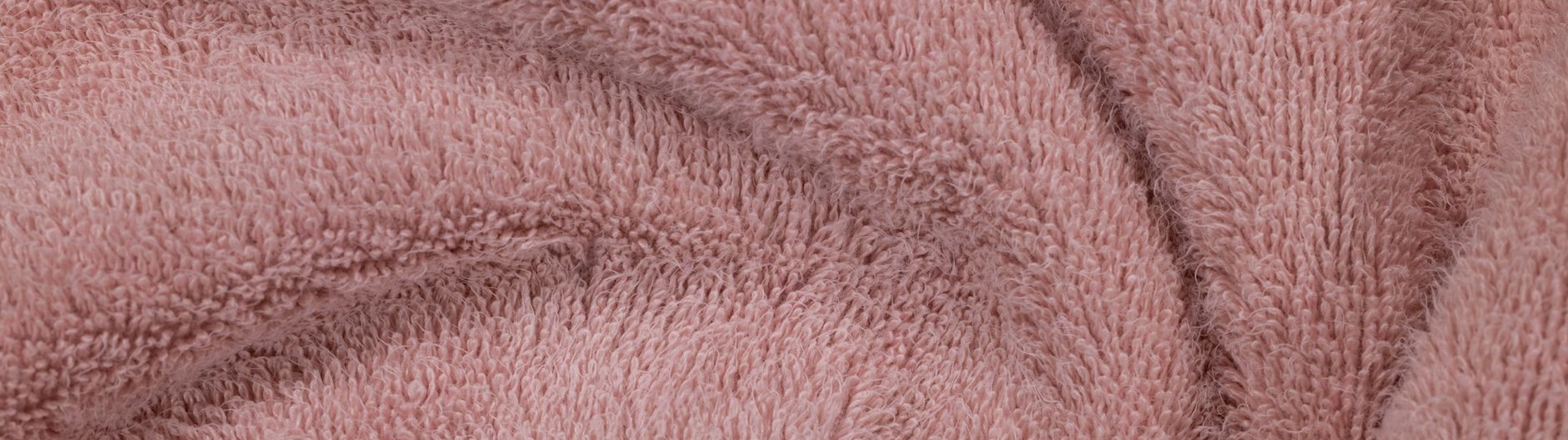 Close-up of cotton terry towel fibers and loops